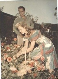 Bogie and Bacall picking flowers